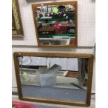 A modern rectangular oak framed wall mirror,