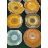 A large collection of Shelley pottery plates with dripware and concentric circle decoration, etc (