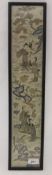 A Chinese embroidered silk panel depicting figures in landscape