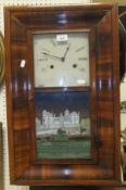 A 19th Century American walnut cased wall clock,