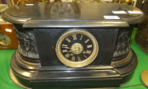 A Victorian bronze and slate cased mantel clock formed as a plinth with eight day movement