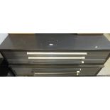 A modern plan chest, and a pair of modern black lacquered bedside tables CONDITION REPORTS