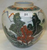 A Chinese porcelain famille verte jar decorated with figures and boats in a landscape CONDITION