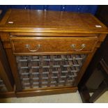 An oak and burr walnut decorated wine rack,