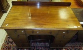 A mahogany kneehole desk,