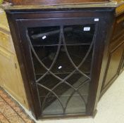 A wall hanging corner cabinet,