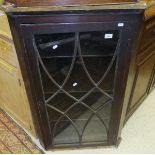 A wall hanging corner cabinet,