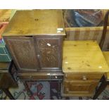 An early 20th Century oak cabinet with two doors above a single drawer on barley twist supports,