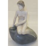 A Royal Copenhagen figure of a mermaid seated upon a rock,  model 4431 CONDITION REPORTS