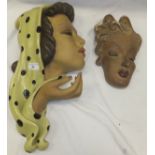 A Jon Douglas Art Deco plaster wall plaque depicting a lady in spotted headscarf,