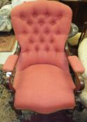 A Victorian mahogany framed serpentine front button back armchair upholstered in pink
