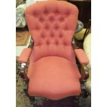 A Victorian mahogany framed serpentine front button back armchair upholstered in pink