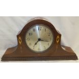 A mahogany and inlaid cased dome top mantel clock,