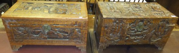 Two small carved camphorwood trunks on bracket feet