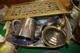 A brass pestle and mortar, large brass trivet on X framed base, brass candlestick, etc.