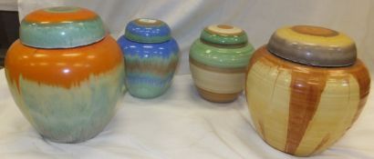 Four Shelley pottery ginger jars and covers with dripware and banded decoration