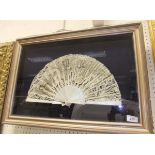 A framed lace and mother of pearl fan decorated with sequined decoration CONDITION REPORTS Fan is