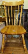 Four modern pine and beech stick back kitchen chairs