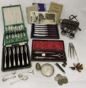 A collection of miscellaneous items to include cased set of six silver forks,