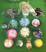 A collection of fourteen various paperweights to include animals, Pegasus, ball on stand, etc.