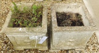 Two composite stone square planters
