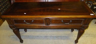 A Univeral Furniture reproduction mahogany sleigh bed in the early 19th Century manner,