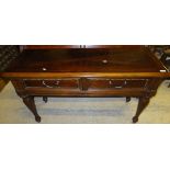A Univeral Furniture reproduction mahogany sleigh bed in the early 19th Century manner,