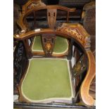 A pair of mahogany and inlaid corner chairs