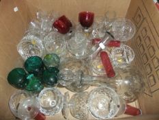 Two decanters, six cranberry coloured custards, an assortment of cut glass wares,