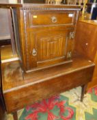 A 19th Century oak rectangular drop-leaf dining table, together with a modern oak side cabinet,