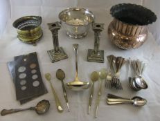 A box containing four horn handled and silver mounted spoons, various plated spoons,