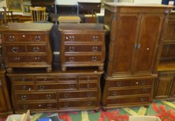 A Louis XV style cherrywood suite by Broyhill comprising armoire with two doors over three drawers,