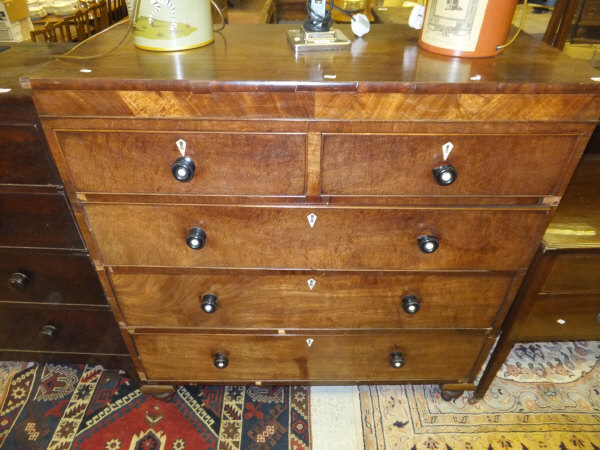 A mahogany chest of two short and three long drawers with turned ebonised handles,