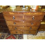 A mahogany chest of two short and three long drawers with turned ebonised handles,