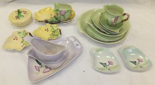 A collection of Carltonware and other leaf decorated trinket dishes, preserve pot, jug, plates,