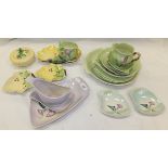 A collection of Carltonware and other leaf decorated trinket dishes, preserve pot, jug, plates,