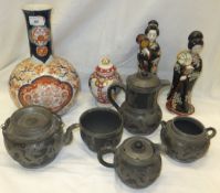 A collection of 20th Century Chinese teapot, hot water pot,