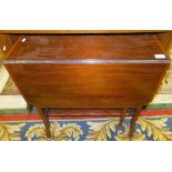 An Edwardian mahogany drop leaf Sutherland table