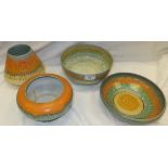 Four pieces of Shelley pottery Harmony dripware in orange and green, to include fruit bowl,