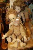 A Merrythought Monkey soft toy, a Norah Wellings cloth doll,