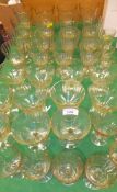 A collection of 39 various Continental facet cut amber glass drinking glasses, wines, liqueurs, etc.