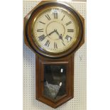 A circa 1900 walnut cased American drop dial wall clock by The Ansonia Clock Co.