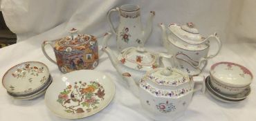 A collection of 19th Century New Hall type teapots, a New Hall type coffee pot, a collection of