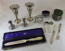 A box of silver and white metal wares, to include a pair of stem vases with pierce edges,