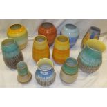 A collection of Shelley pottery vases with dripware and ringed decoration, to include a pair of