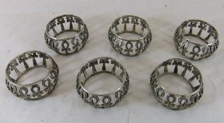 A set of six Egyptian white metal napkin rings decorated with Ankh