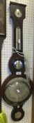 A 19th Century rosewood cased barometer/thermometer with silvered dial and alcohol thermometer