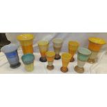 A collection of Shelley pottery wares, to include a pair of vases with graduated banding in orange,