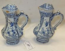 A pair of small Dutch Delft lidded ewers, each inscribed "WVDB56" to base CONDITION REPORTS Height
