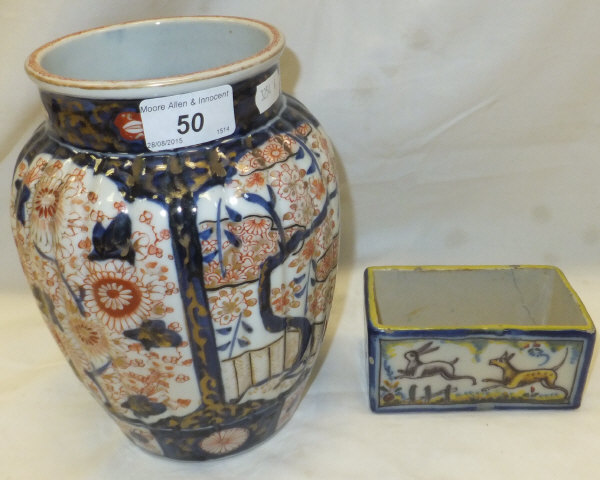 A Chinese Imari vase with ribbed decoration to sides,